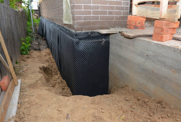 Happy homeowners after waterproofing job in Sylvia